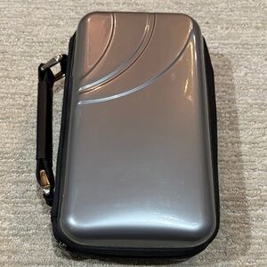 Silver Hard Shell Carrying Case holds 96 CD/DVDs